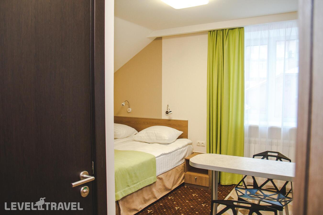фотографии номера Улучшенный комфорт (двуспальная кровать) отеля Tyumen Time Hotel в Россия(Тюмень) - фото №2
