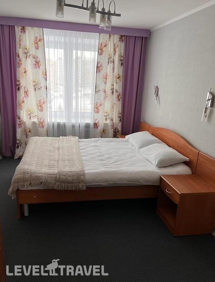 фотографии номера Номер Комфорт (2 комнаты) отеля Гостиница Балаково в Россия(Балаково) - фото №5