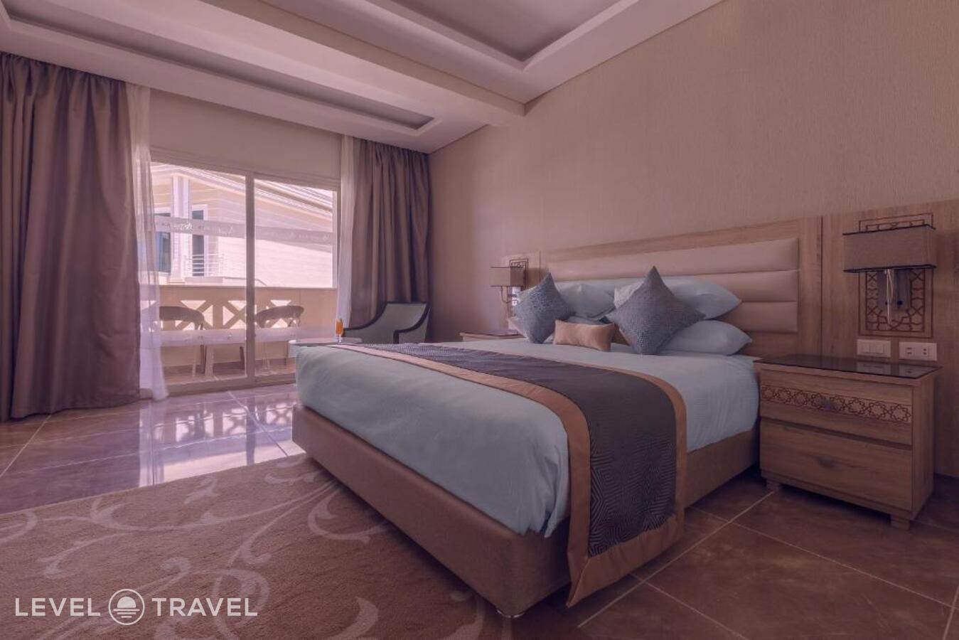 фотографии номера Делюкс с видом на бассейн отеля Pickalbatros Aqua Blu Resort Hurghada (Ex. Albatros Sea World) в Египет(Хургада (город)) - фото №5