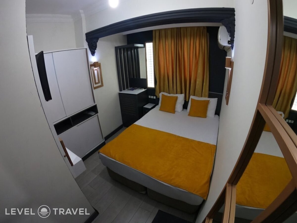 фотографии номера Трехместный номер отеля Exporoyal Hotel в Турция(Анталья - Центр) - фото №17