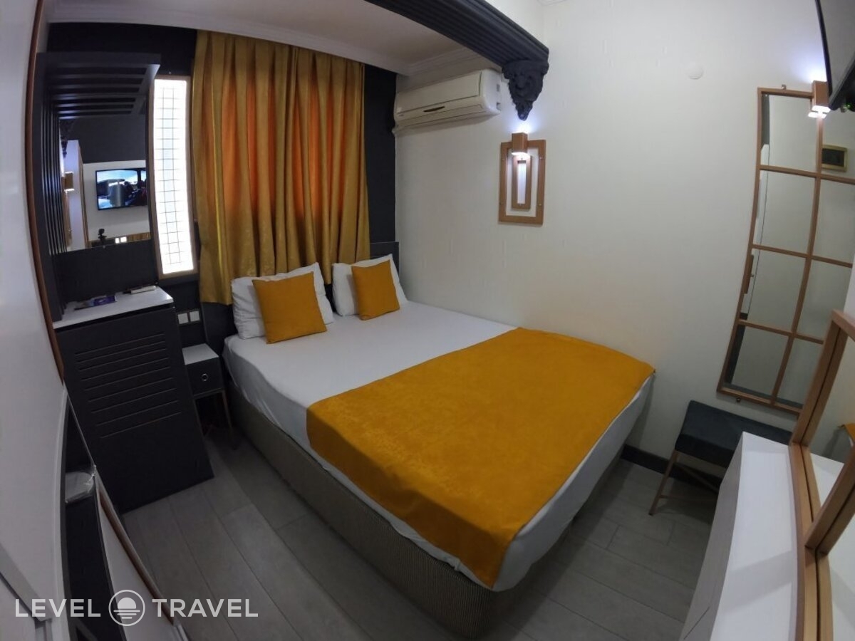 фотографии номера Трехместный номер отеля Exporoyal Hotel в Турция(Анталья - Центр) - фото №19