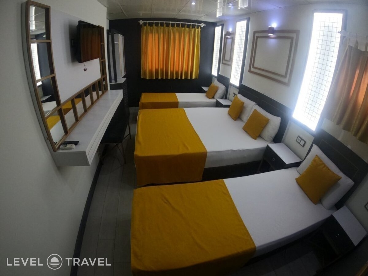 фотографии номера Трехместный номер отеля Exporoyal Hotel в Турция(Анталья - Центр) - фото №9
