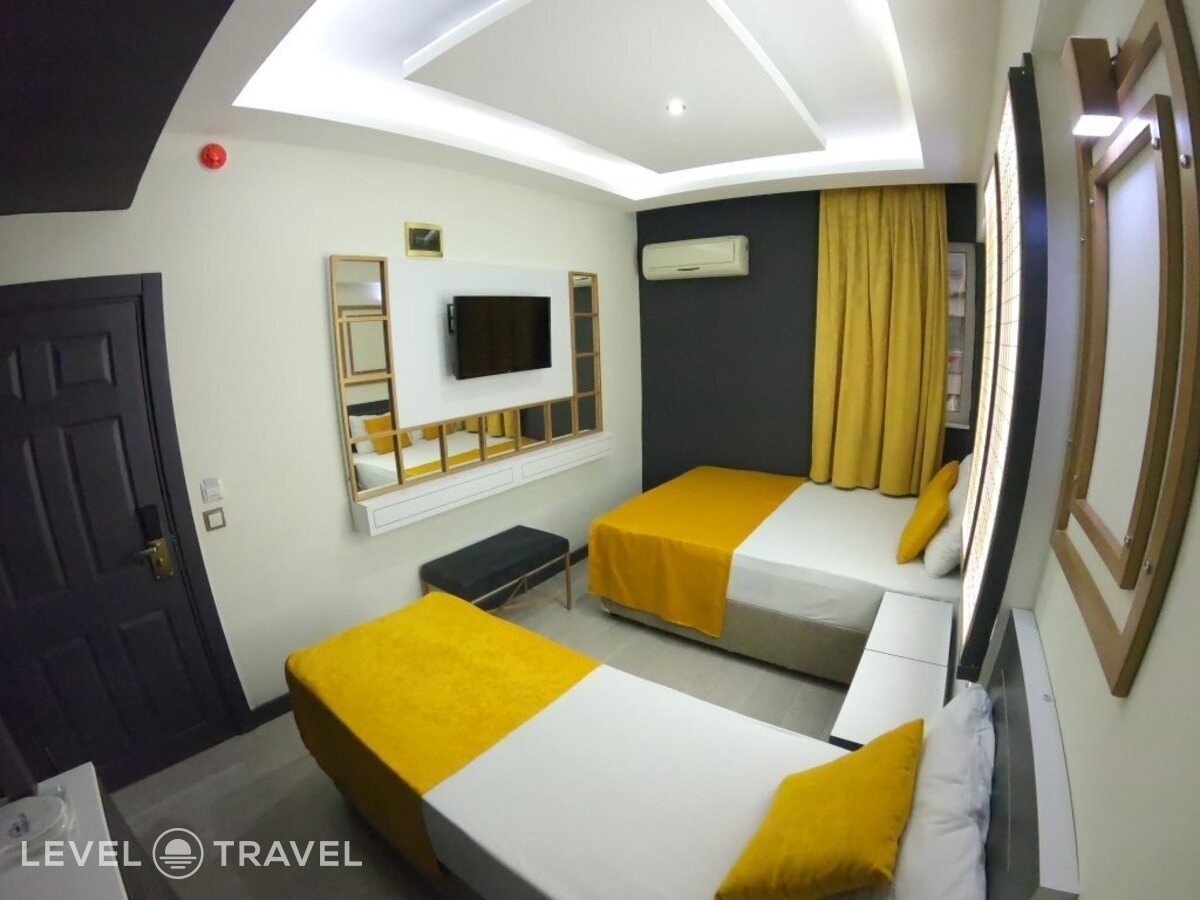 фотографии номера Трехместный номер отеля Exporoyal Hotel в Турция(Анталья - Центр) - фото №43