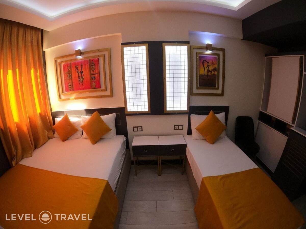 фотографии номера Трехместный номер отеля Exporoyal Hotel в Турция(Анталья - Центр) - фото №3