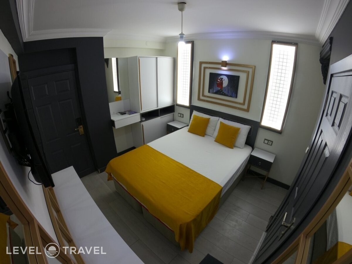 фотографии номера Трехместный номер отеля Exporoyal Hotel в Турция(Анталья - Центр) - фото №51