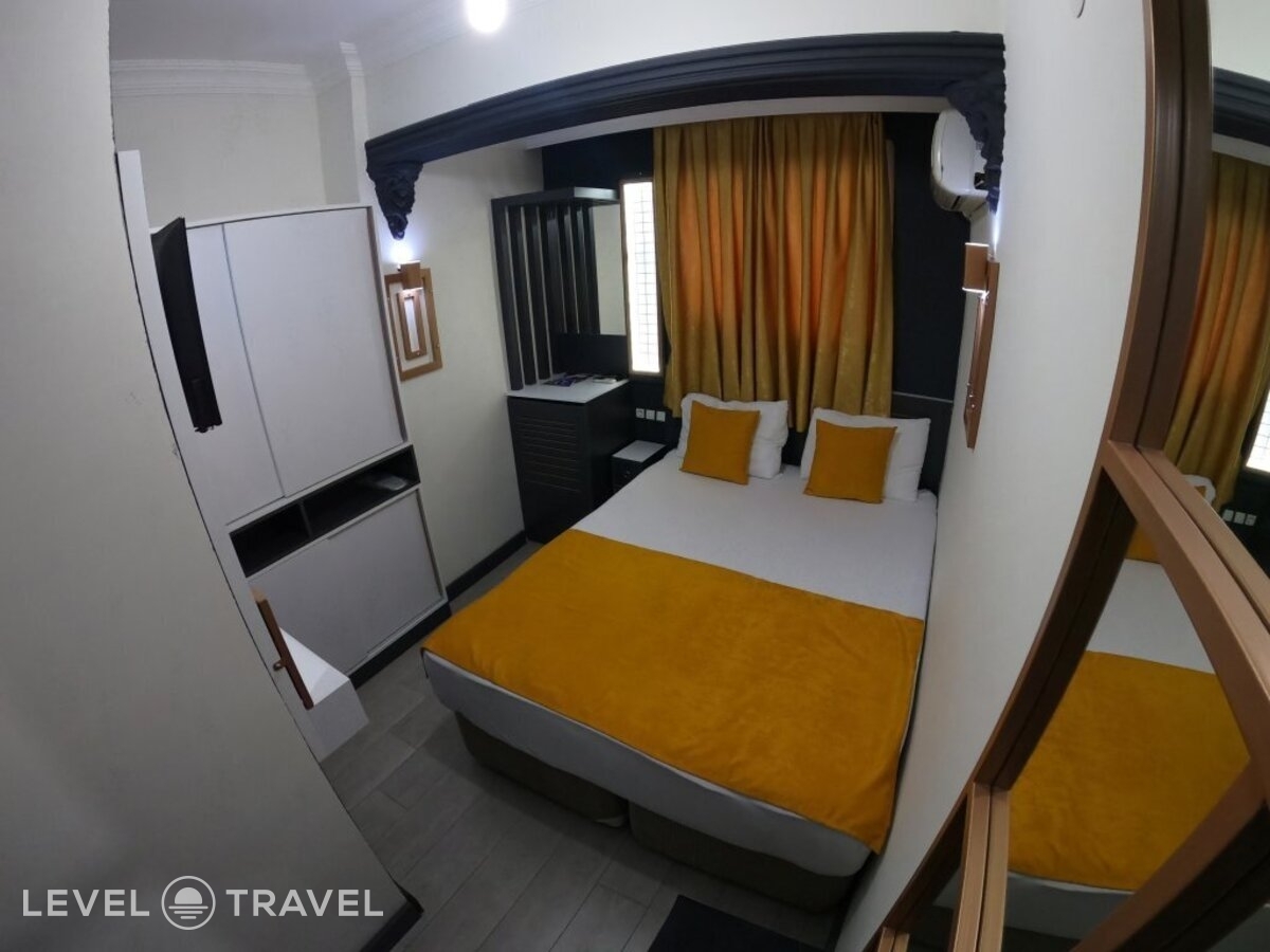 фотографии номера Трехместный номер отеля Exporoyal Hotel в Турция(Анталья - Центр) - фото №52
