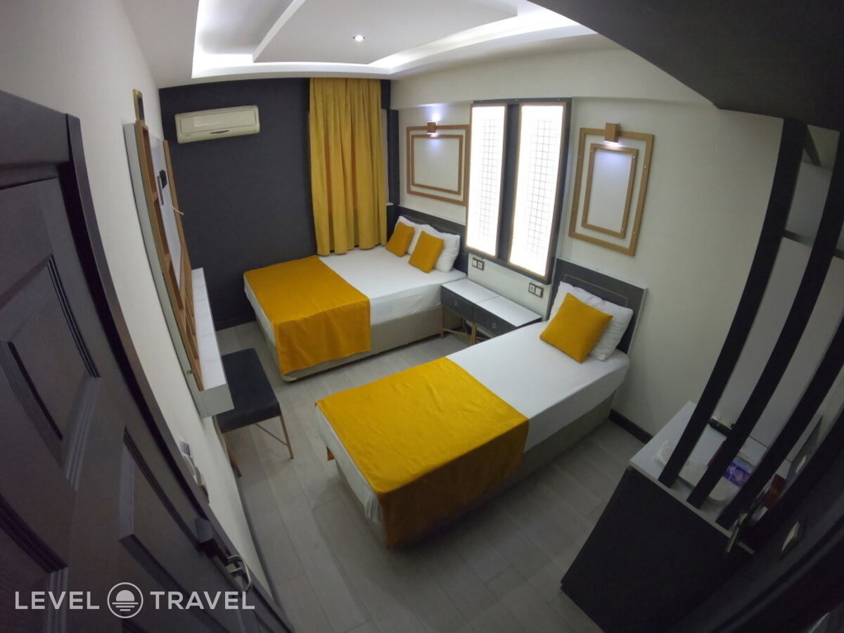 фотографии номера Трехместный номер отеля Exporoyal Hotel в Турция(Анталья - Центр) - фото №41