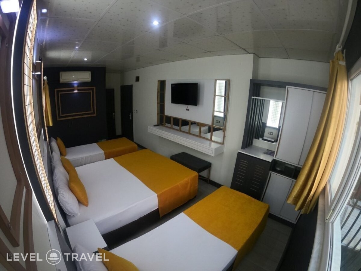 фотографии номера Трехместный номер отеля Exporoyal Hotel в Турция(Анталья - Центр) - фото №11