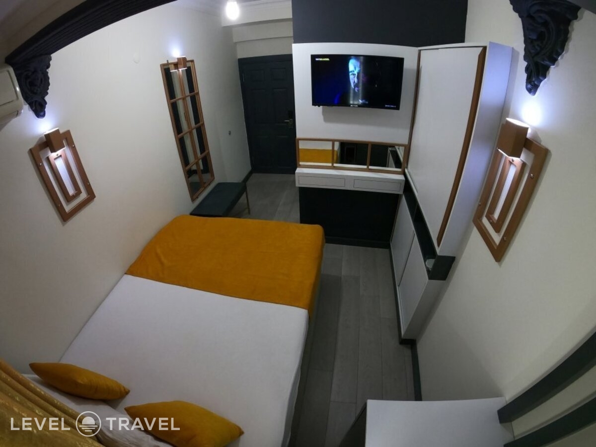 фотографии номера Трехместный номер отеля Exporoyal Hotel в Турция(Анталья - Центр) - фото №53