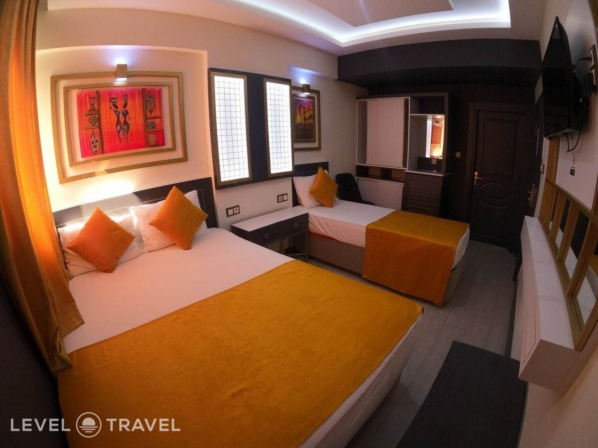 фотографии номера Трехместный номер отеля Exporoyal Hotel в Турция(Анталья - Центр) - фото №4