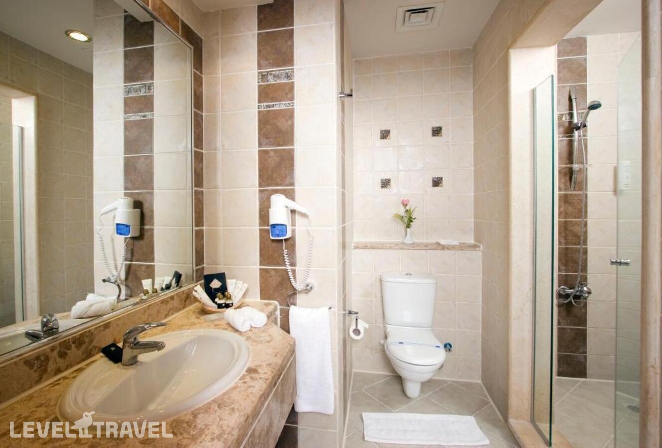 фотографии номера Стандартный номер отеля Swiss Inn Pyramids Golf в Египет(Каир) - фото №3