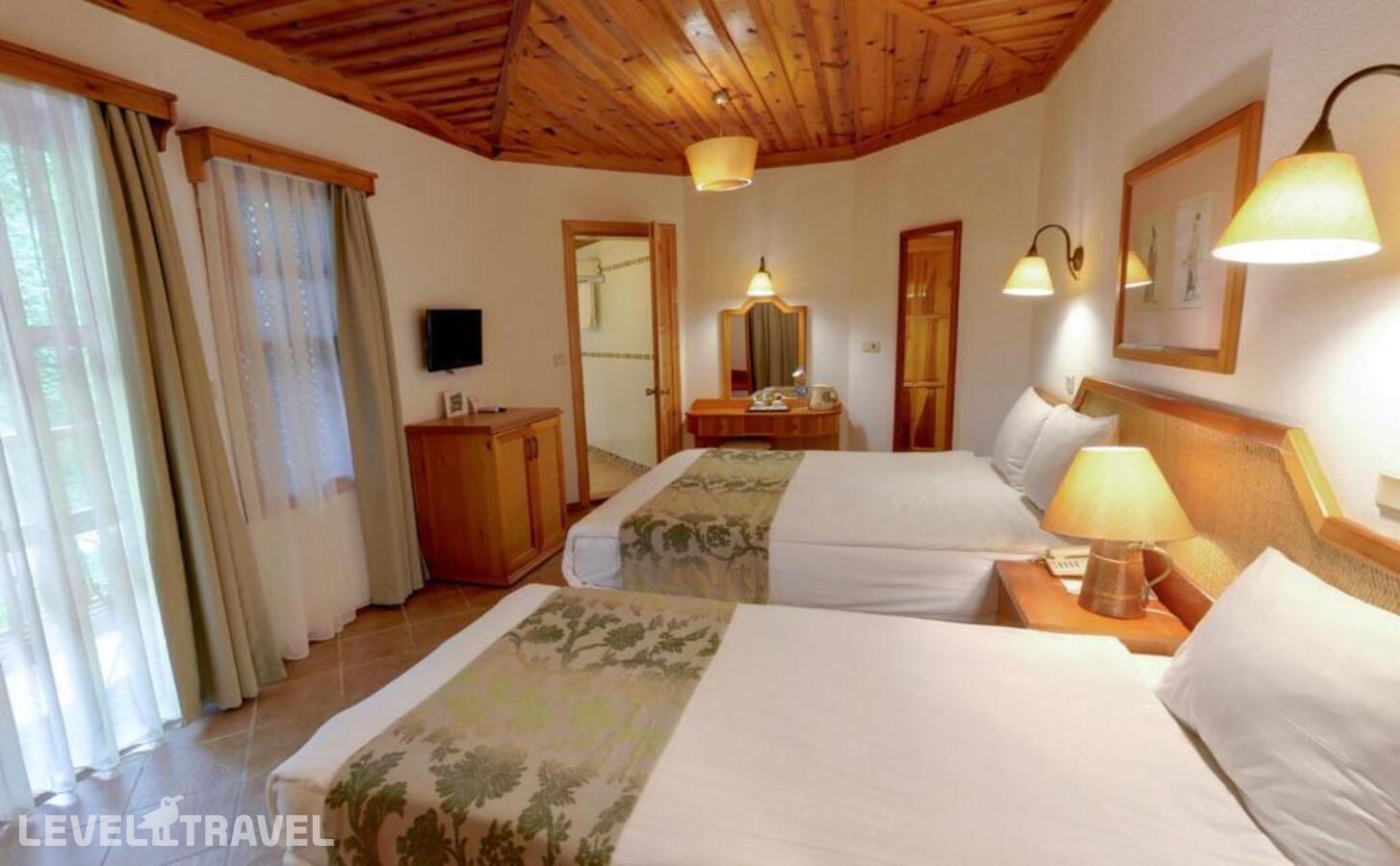 фотографии номера Трехместный номер отеля Montana Pine Resort в Турция(Олюдениз) - фото №6