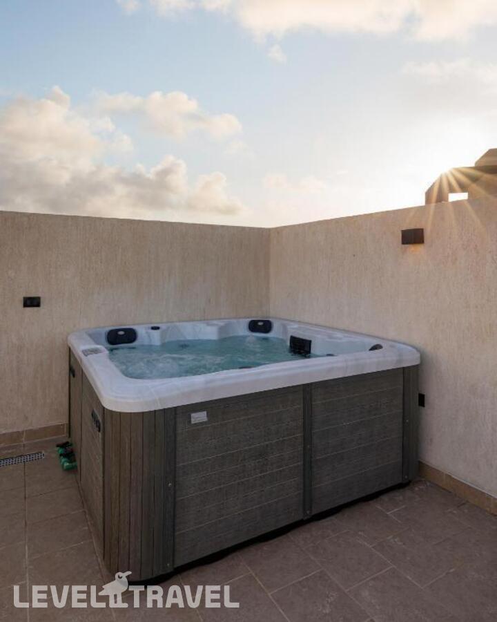 фотографии номера Полулюкс с джакузи отеля Creek Hotel & Residences El Gouna в Египет(Эль Гуна) - фото №1