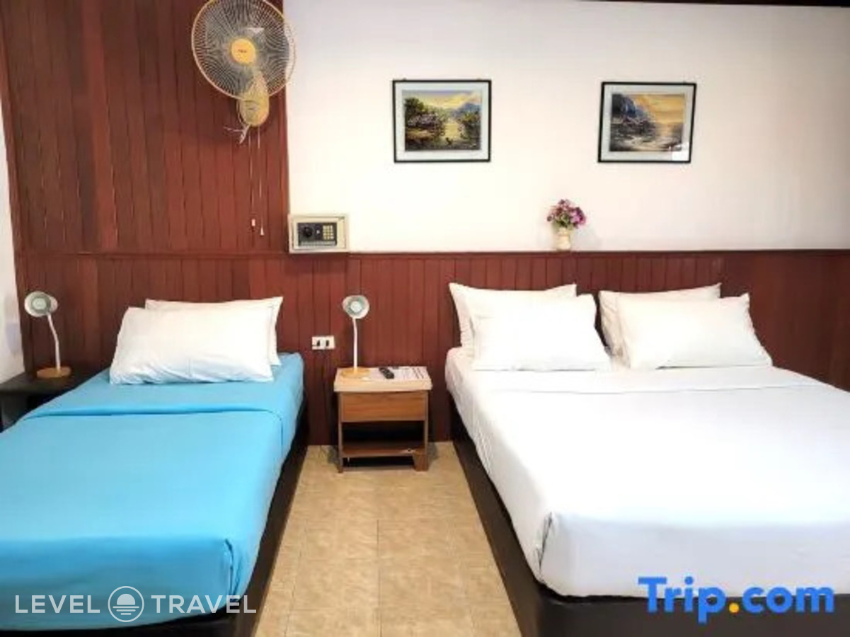 фотографии номера Трехместный делюкс с балконом отеля Rabbit Mansion Patong Hotel в Таиланд(Патонг Бич) - фото №2