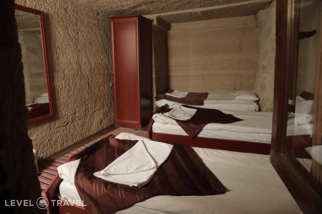 фотографии номера Четырехместный номер отеля Guven Cave Hotel в Турция(Гёреме) - фото №4
