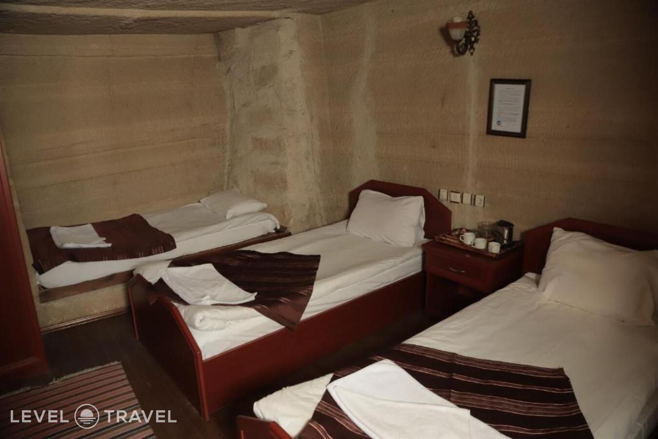 фотографии номера Четырехместный номер отеля Guven Cave Hotel в Турция(Гёреме) - фото №5