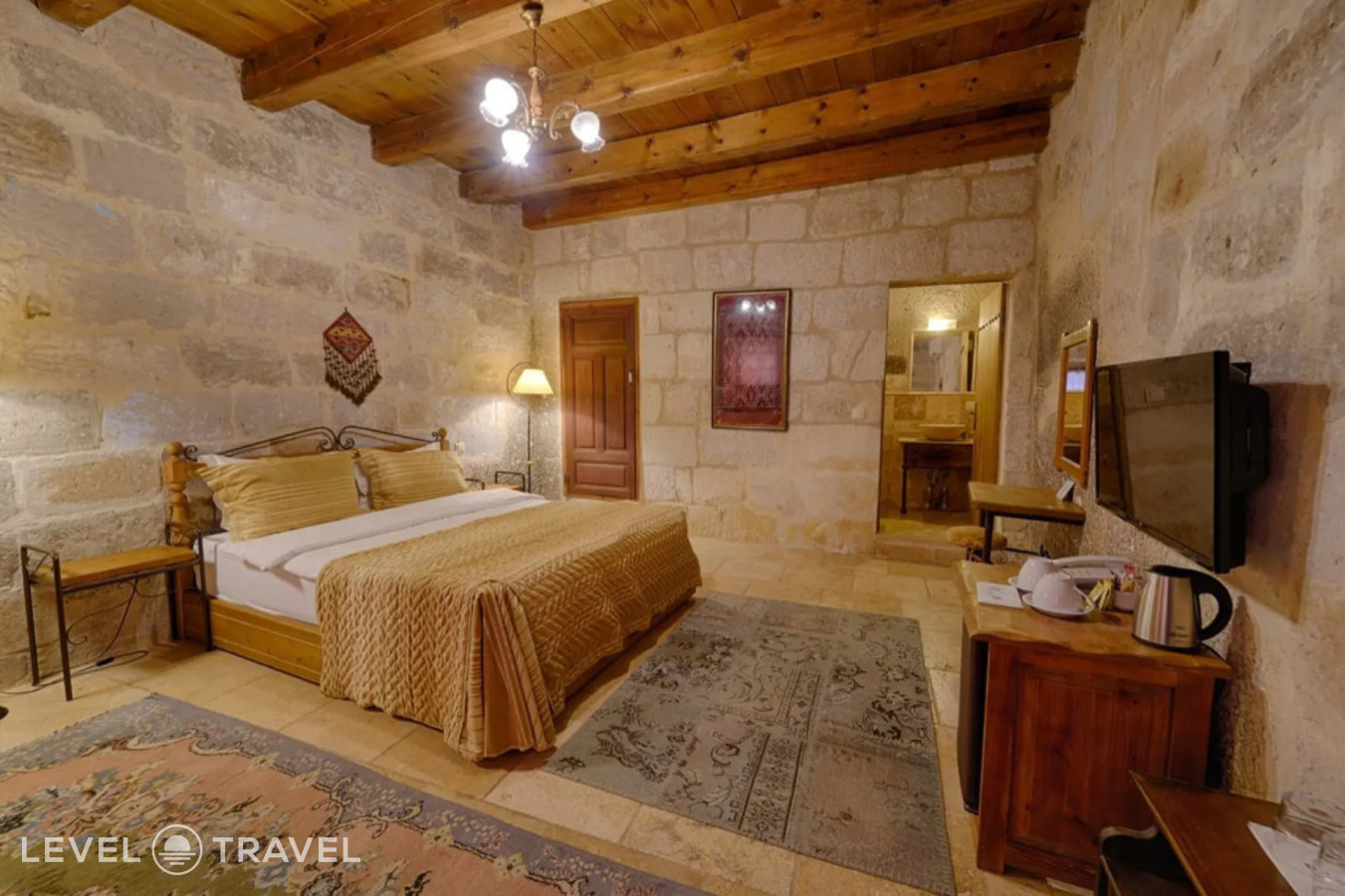 фотографии номера Двухместный полулюкс Cave двуспальная кровать отеля Tekkaya Cave Hotel в Турция(Гёреме) - фото №1