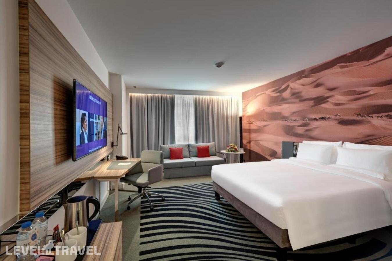 фотографии номера Семейный номер отеля Novotel Sharjah Expo Centre в ОАЭ(Шарджа) - фото №2