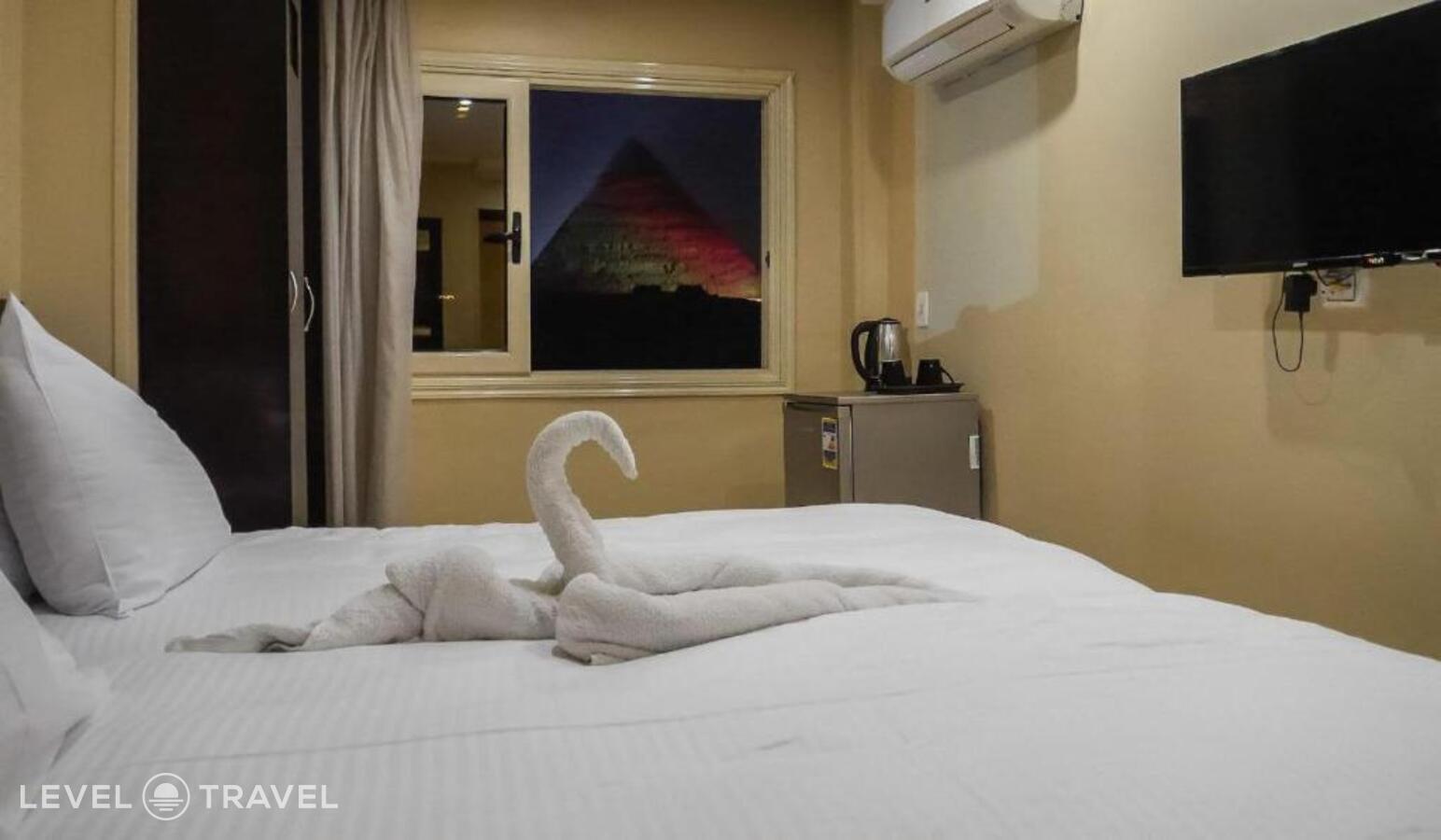 фотографии номера Делюкс отеля Egypt Pyramids Inn в Египет(Гиза) - фото №3