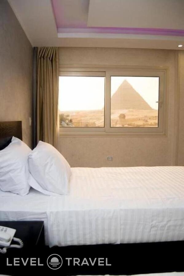 фотографии номера Делюкс (две односпальные кровати) отеля Egypt Pyramids Inn в Египет(Гиза) - фото №2