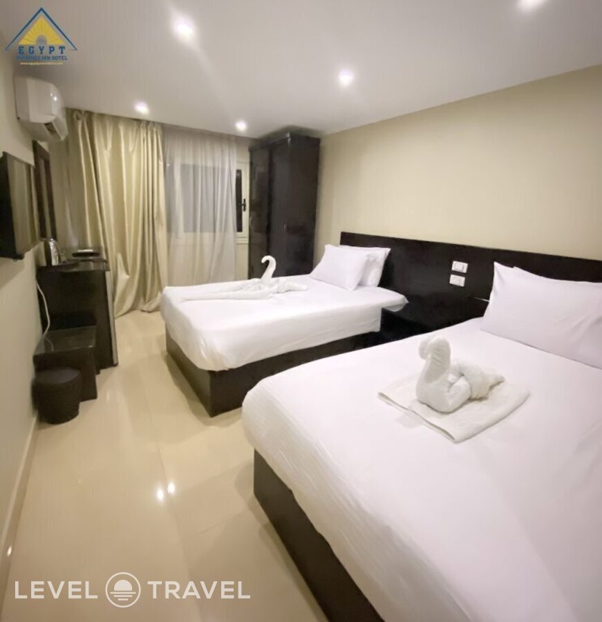 фотографии номера Делюкс (две односпальные кровати) отеля Egypt Pyramids Inn в Египет(Гиза) - фото №1