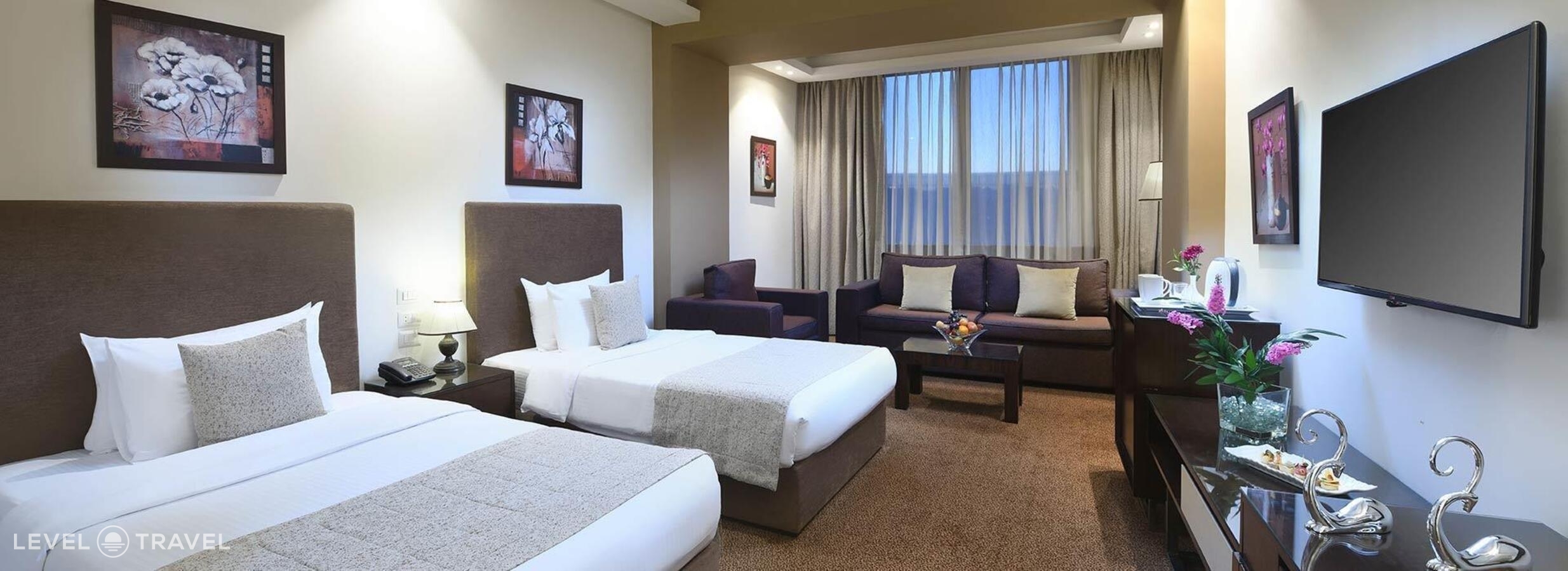 фотографии номера Делюкс (две односпальные кровати) отеля Tolip El Narges Hotel & Spa в Египет(Каир) - фото №1