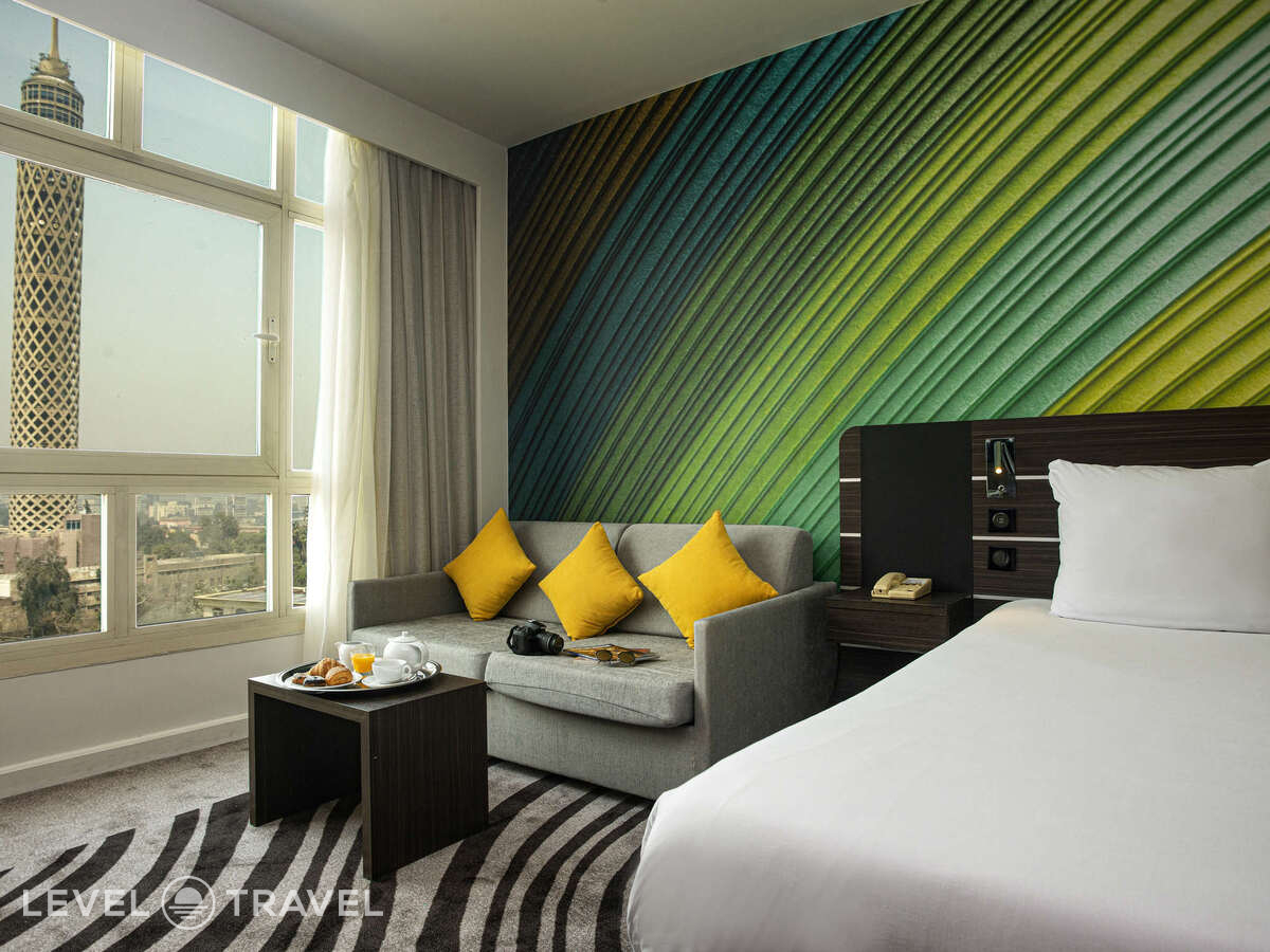 фотографии номера Улучшенный (двуспальная кровать и софа) отеля Hotel Novotel Cairo El Borg в Египет(Каир) - фото №2