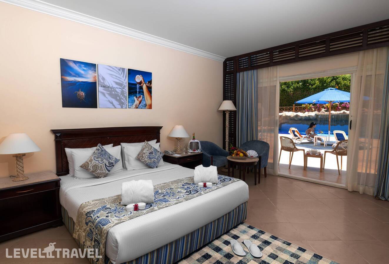 фотографии номера Стандартный с видом на бассейн или сад отеля Amwaj Oyoun Resort & Casino в Египет(Шарм-эль-Шейх) - фото №1