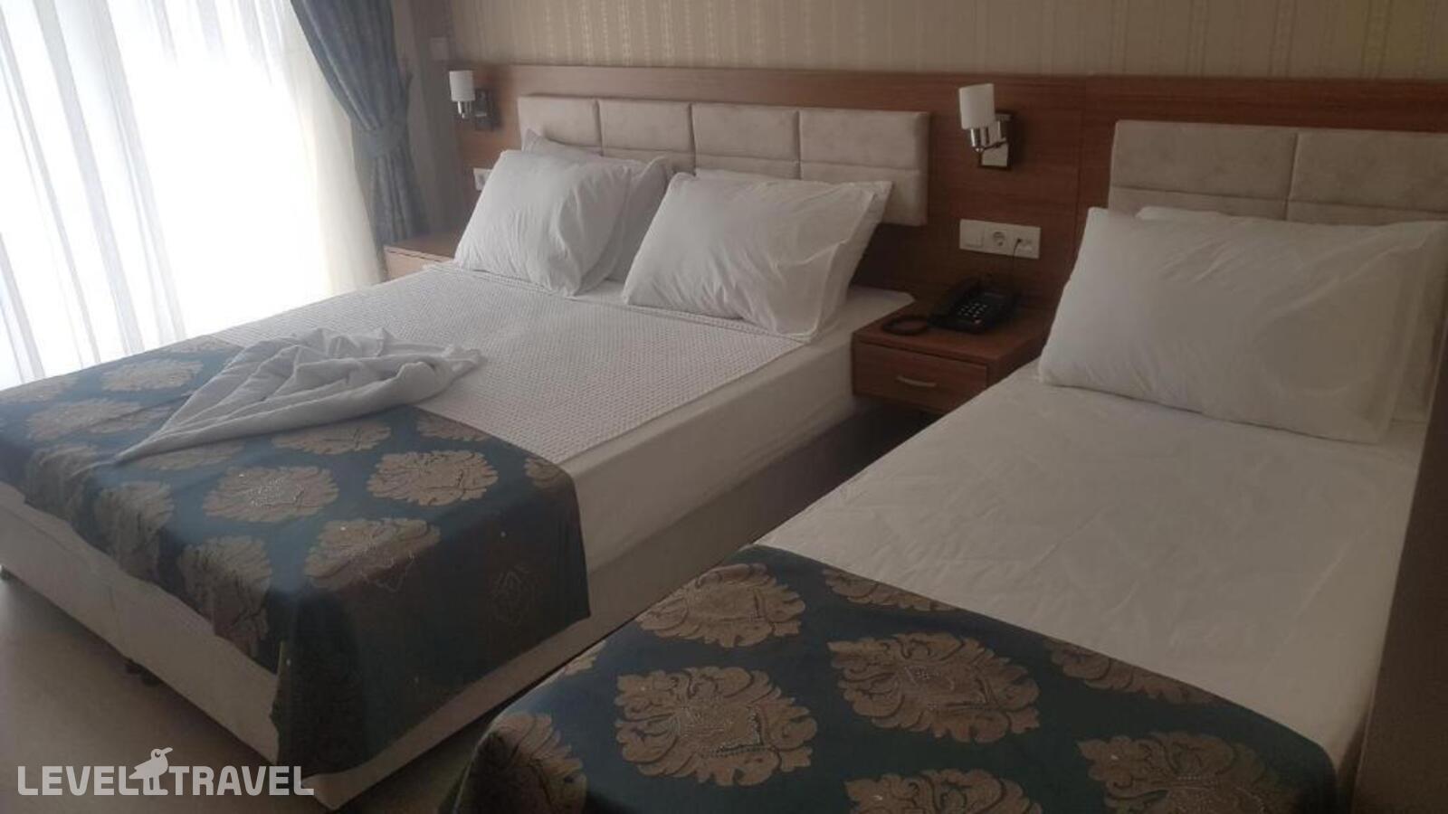 фотографии номера Трехместный номер отеля Olympic Hotels Belek в Турция(Кадрие) - фото №1