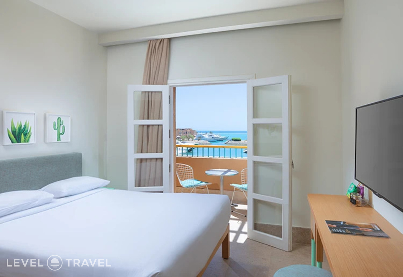 фотографии номера Улучшенный с видом на море отеля Captains Inn Hotel в Египет(Эль Гуна) - фото №1