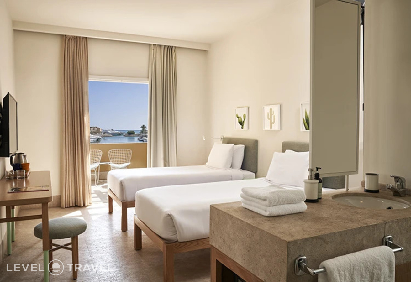 фотографии номера Улучшенный с видом на море отеля Captains Inn Hotel в Египет(Эль Гуна) - фото №4