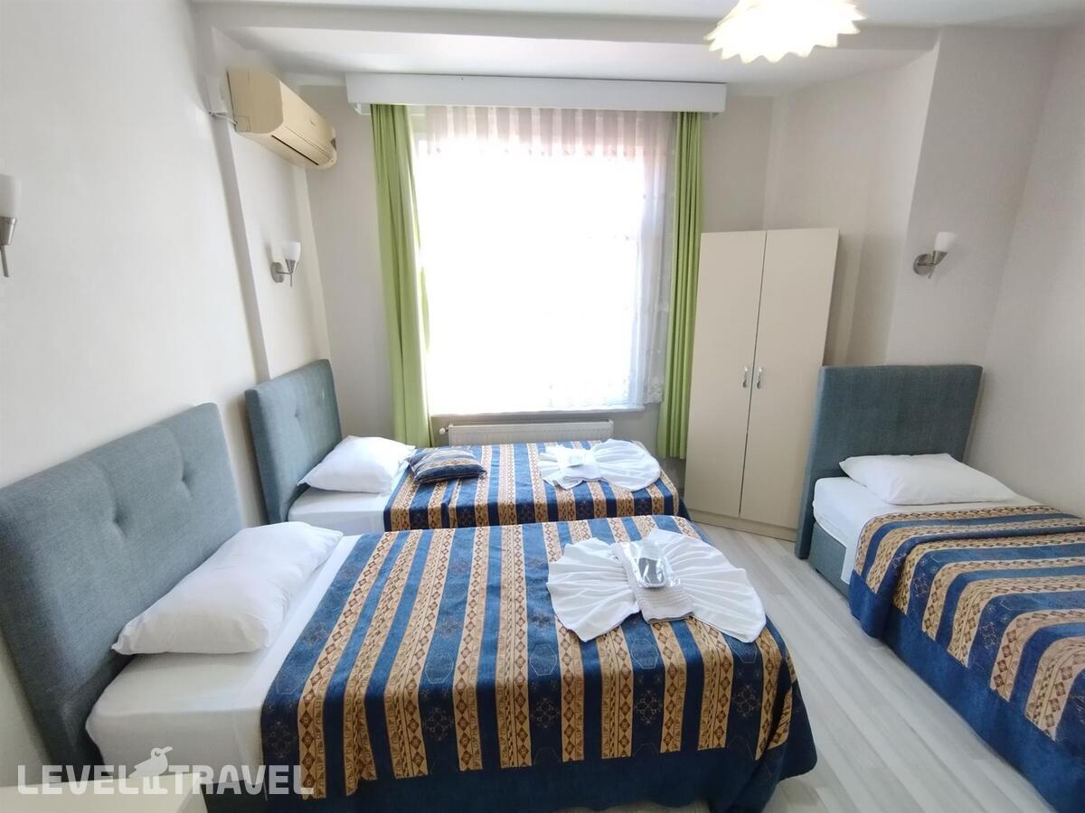 фотографии номера Трехместный номер отеля Anadolu Hotel в Турция(Фатих) - фото №1
