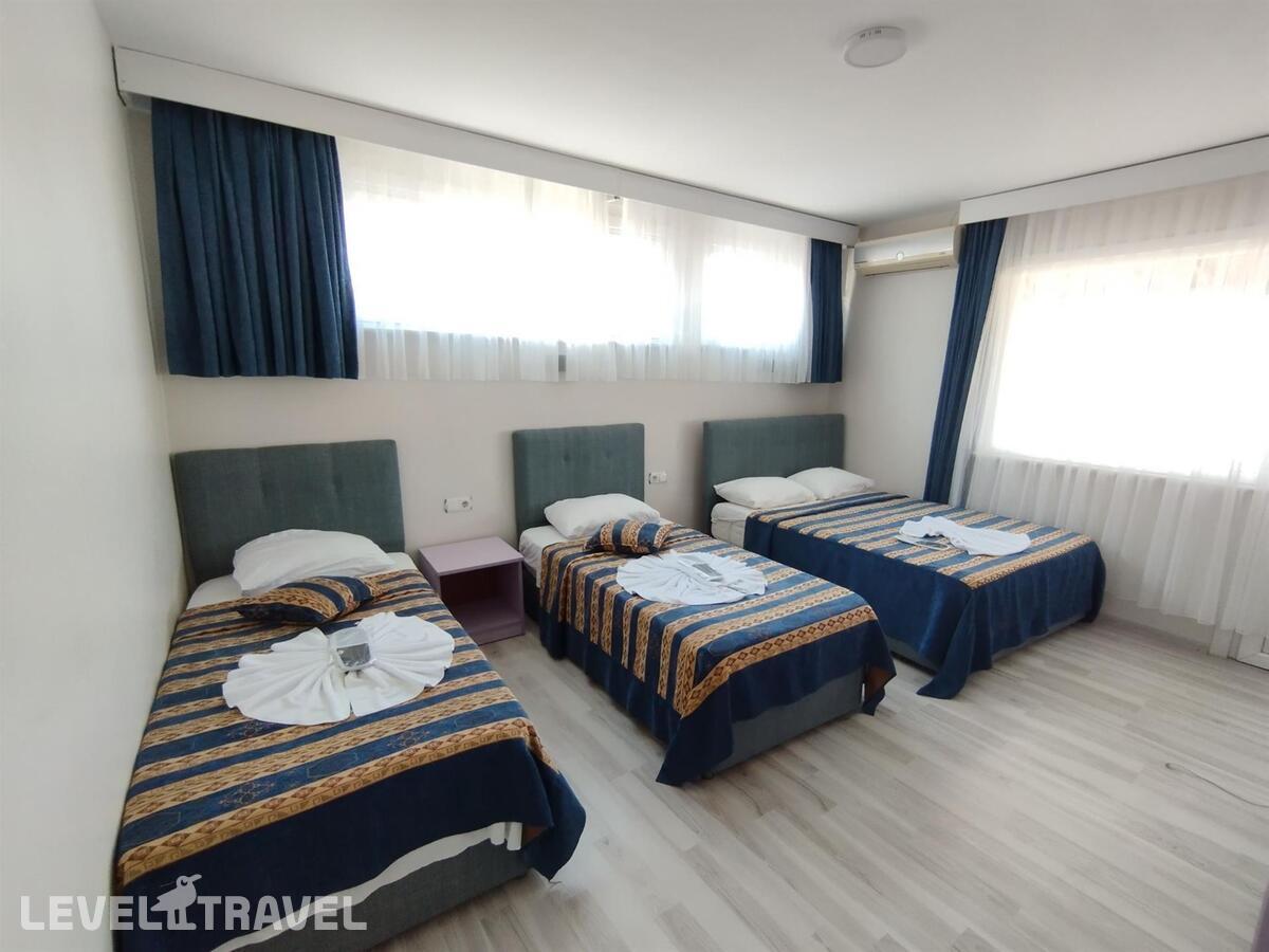 фотографии номера Семейный номер отеля Anadolu Hotel в Турция(Фатих) - фото №1
