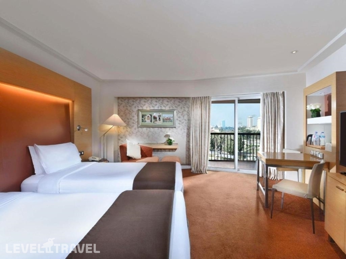фотографии номера Премиум (две односпальные кровати) отеля Sofitel Cairo Nile El Gezirah в Египет(Каир) - фото №1