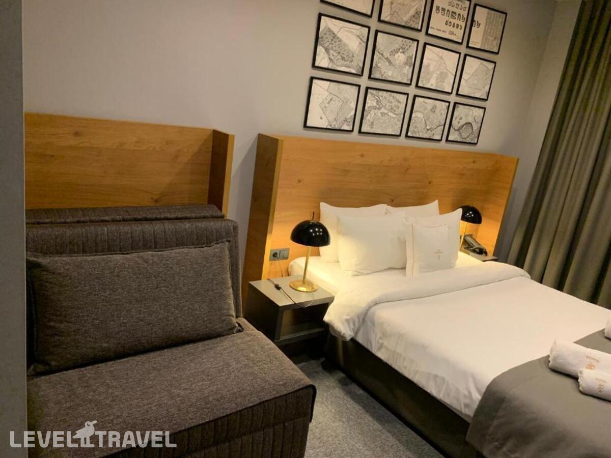 фотографии номера Трехместный экономичный отеля Hotel Tuta в Грузия(Тбилиси) - фото №2
