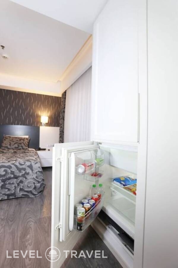 фотографии номера Номер Deluxe с балконом и с видом на город отеля Alsancak в Турция(Измир) - фото №4