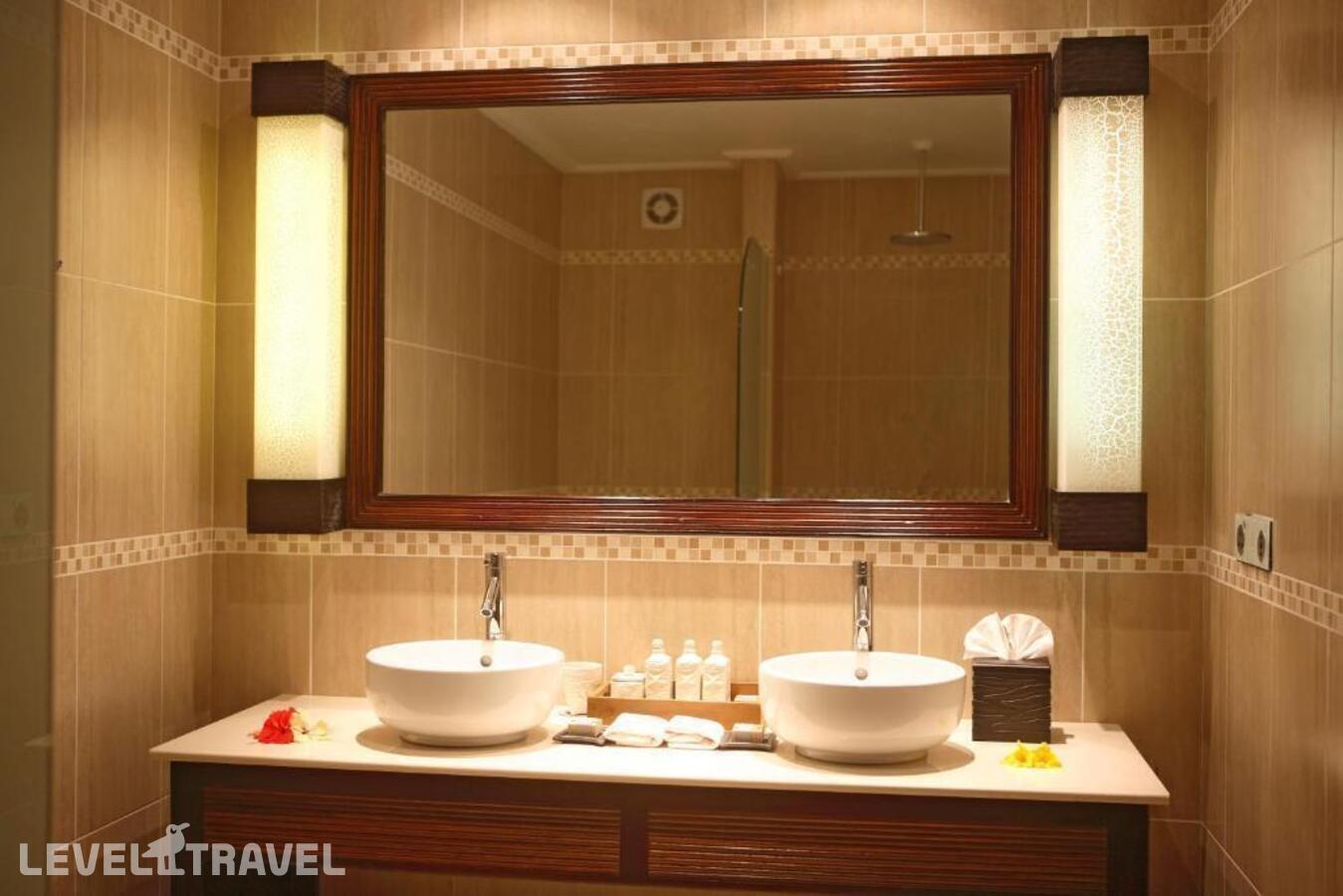 фотографии номера Делюкс с видом на океан отеля Double Tree By Hilton Seychelles Allamanda Resort & Spa в Сейшелы(о. Маэ) - фото №4