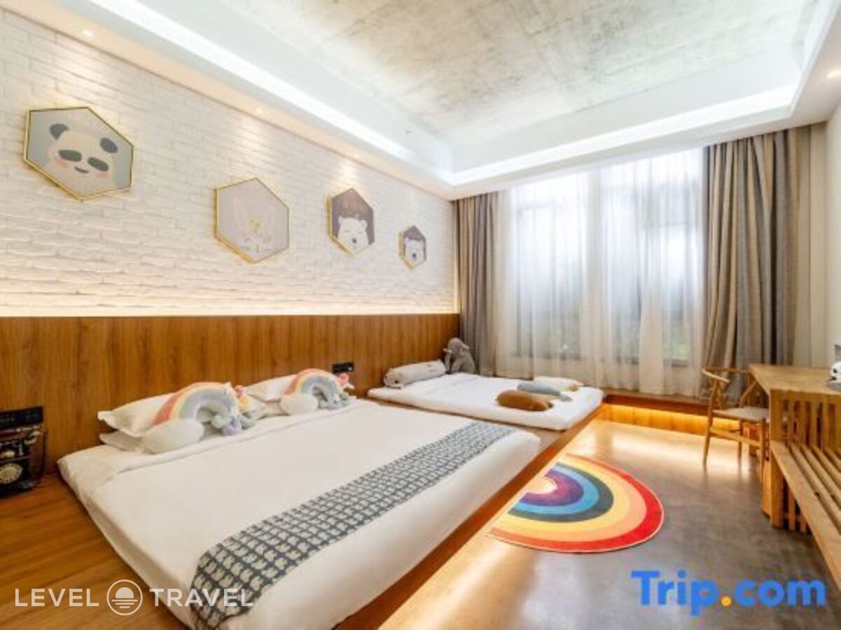 фотографии номера Семейный (две односпальные кровати) отеля Lin Yin Art Hotel Shanghai в Китай(Шанхай) - фото №9