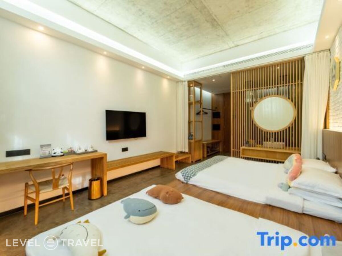 фотографии номера Семейный (две односпальные кровати) отеля Lin Yin Art Hotel Shanghai в Китай(Шанхай) - фото №10
