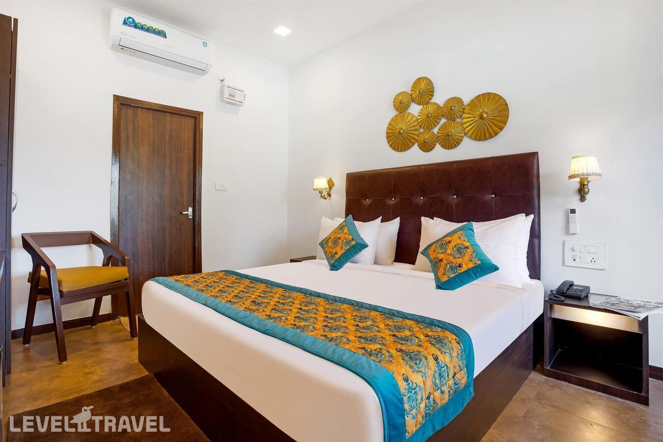фотографии номера Премиум с видом на бассейн отеля Aurum Resort (Ex.Auram Resort) в Индия(Морджим) - фото №1