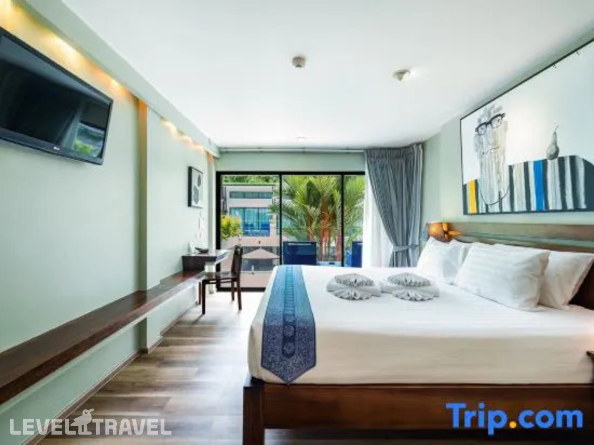 фотографии номера Делюкс с видом на бассейн отеля CC's Hideaway Hotel (Ex.C.C. Blooms) в Таиланд(Ката Бич) - фото №2