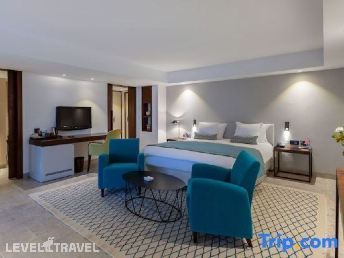 фотографии номера Номер Executive рядом с пляжем отеля Movenpick Gammarth в Тунис(Гаммарт) - фото №11