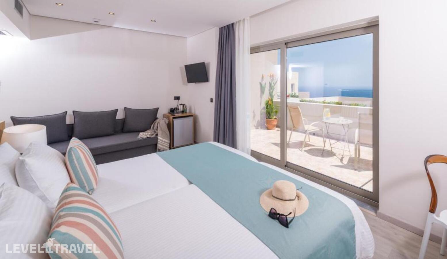 фотографии номера Улучшенный с видом на море отеля Athina Palace Resort & Spa в Греция(Агия-Пелагия) - фото №2