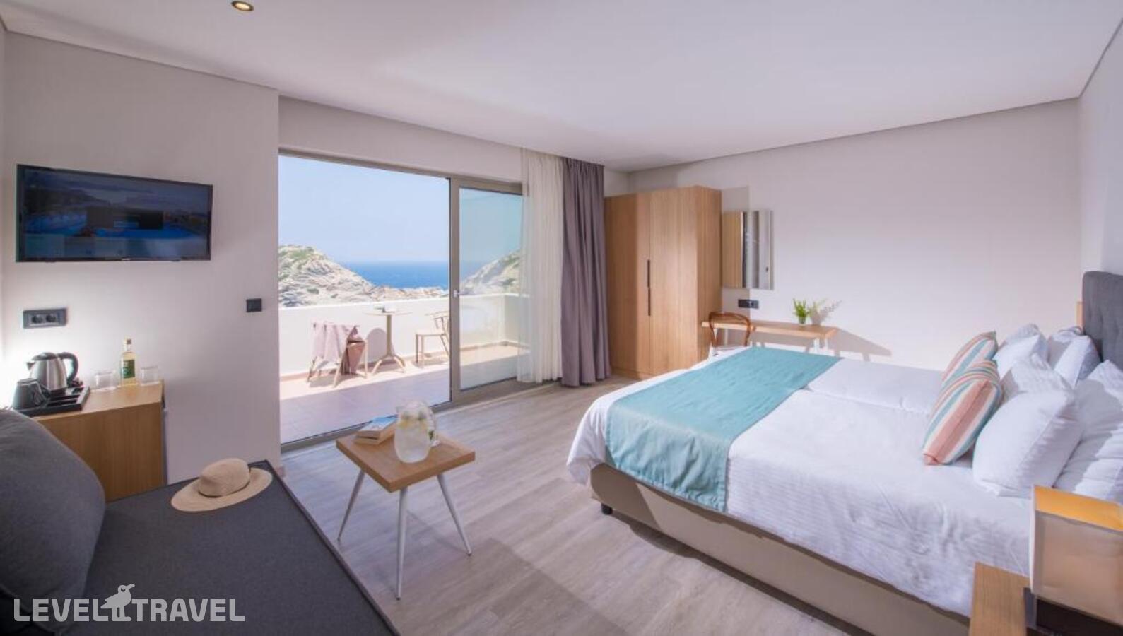 фотографии номера Улучшенный с видом на море отеля Athina Palace Resort & Spa в Греция(Агия-Пелагия) - фото №3