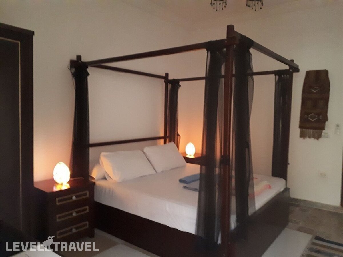 фотографии номера Делюкс отеля Arabian Nights Pyramids Guesthouse в Египет(Гиза) - фото №2