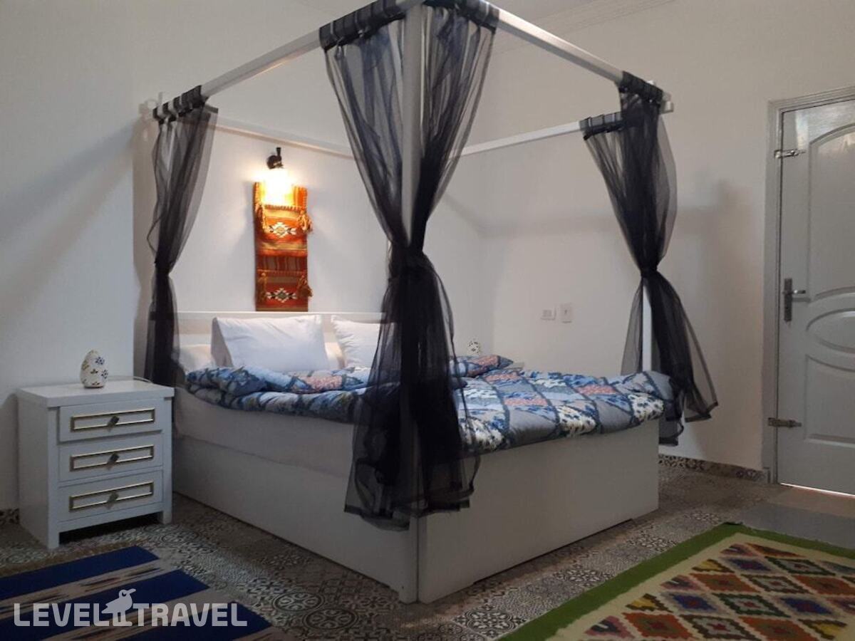 фотографии номера Делюкс отеля Arabian Nights Pyramids Guesthouse в Египет(Гиза) - фото №6