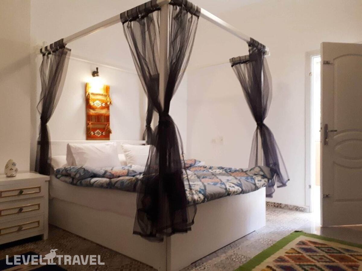 фотографии номера Делюкс отеля Arabian Nights Pyramids Guesthouse в Египет(Гиза) - фото №5