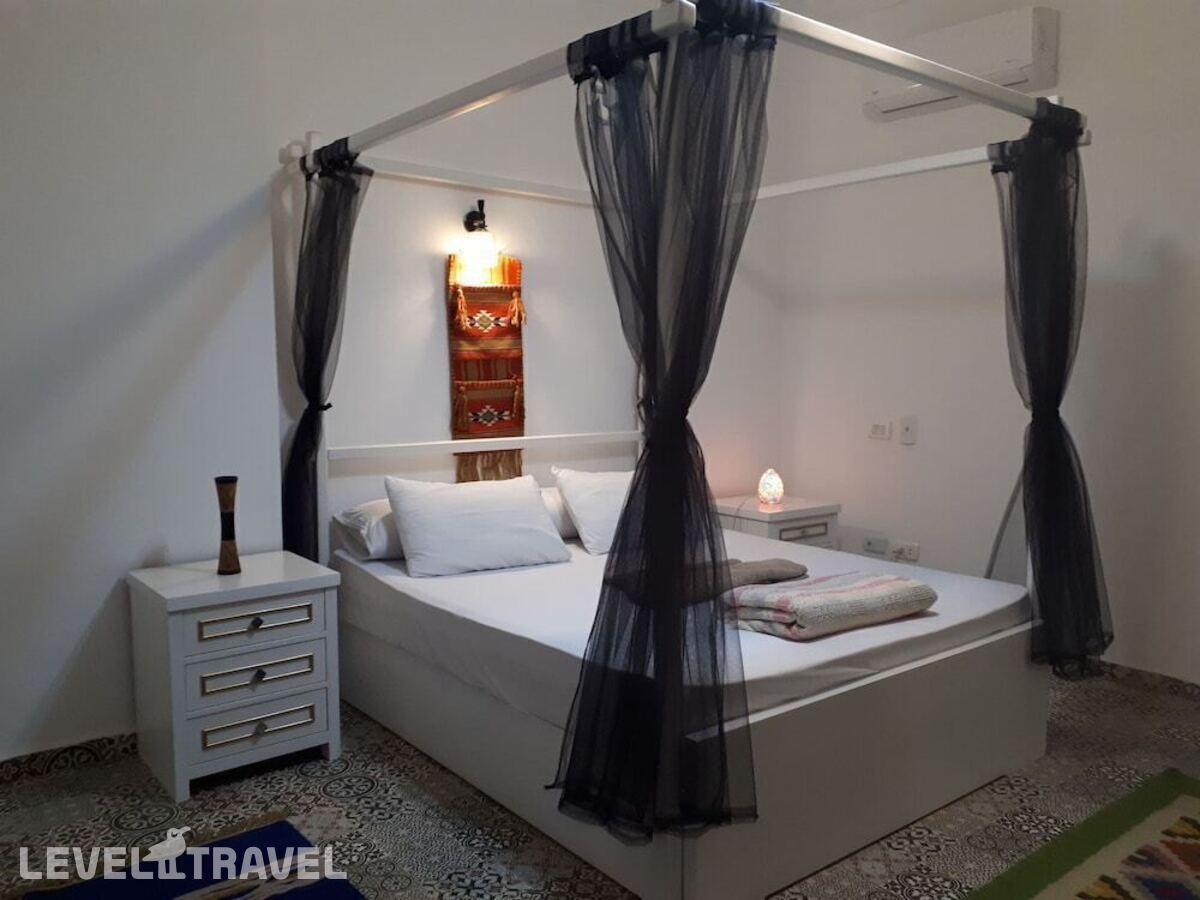фотографии номера Делюкс отеля Arabian Nights Pyramids Guesthouse в Египет(Гиза) - фото №3