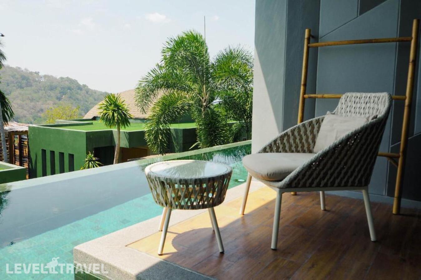фотографии номера Двухместный номер Pool Access Deluxe двуспальная кровать отеля Crest Resort & Pool Villas в Таиланд(Три Транг Бич) - фото №8