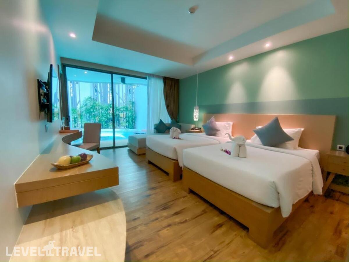 фотографии номера Двухместный номер Pool Access Deluxe двуспальная кровать отеля Crest Resort & Pool Villas в Таиланд(Три Транг Бич) - фото №3